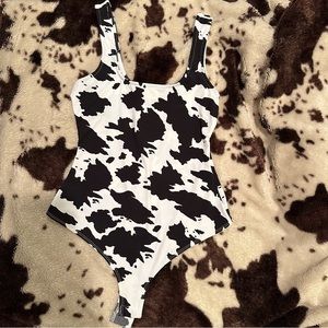 Black and white Cowprint bodysuit size small